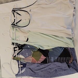Bundle of 4 Under Armour Heat Gear Tanks
